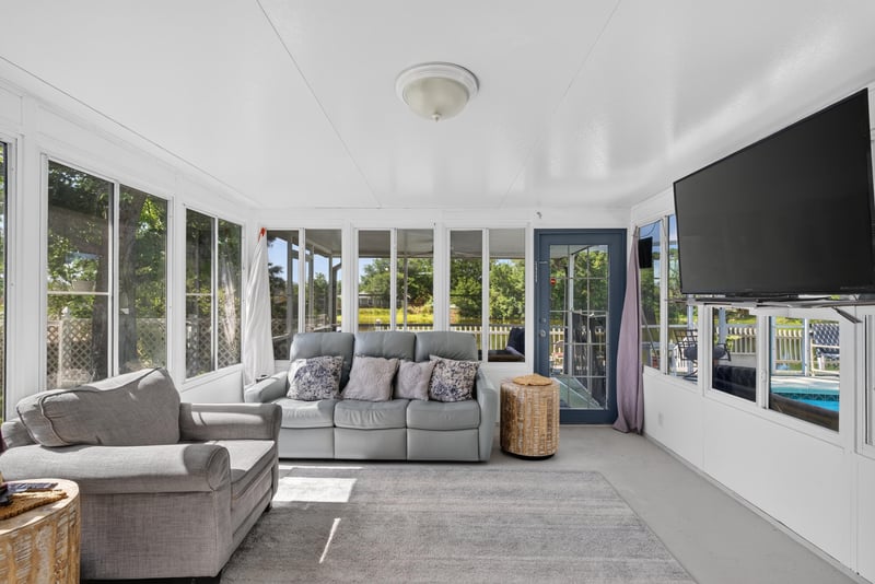 Sunroom with sliding doors at 8680 Bandera Cir S, Jacksonville, FL 32244
