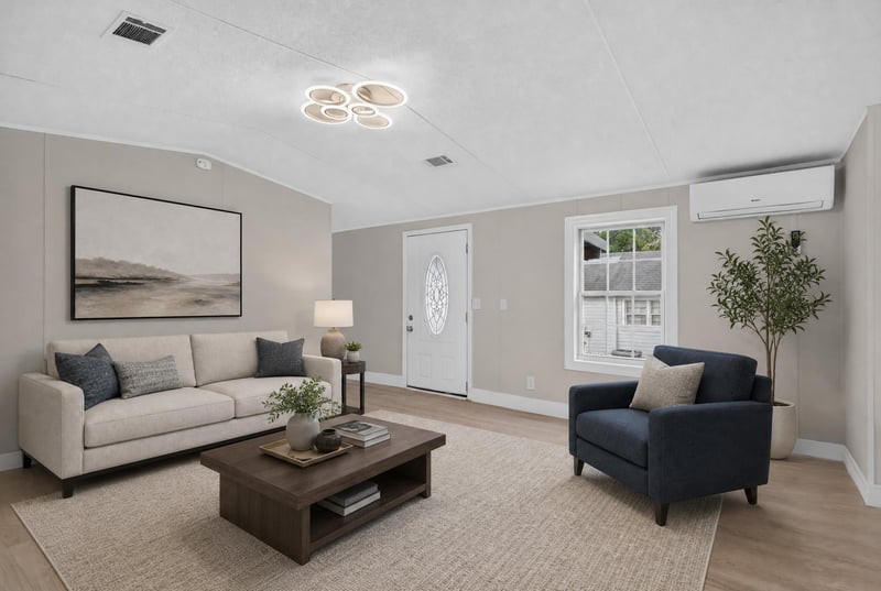 Living room staged with sofa, chair and coffee table at 4565 Appleton Ave, Jacksonville, FL