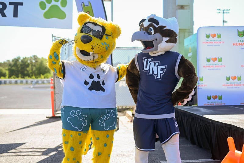 University mascots at a campus event in Jacksonville