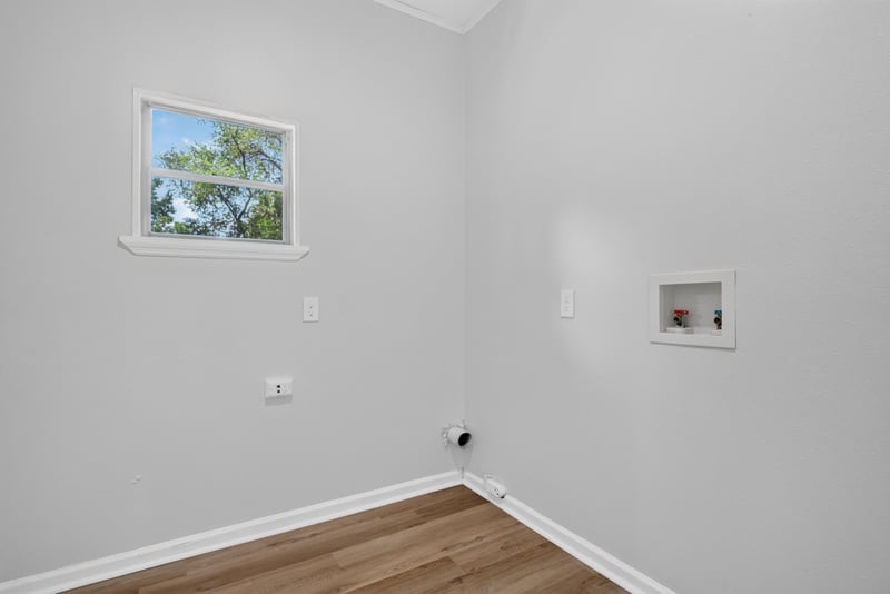 Laundry nook with window at 855 Cornwallis Dr, Jacksonville, FL