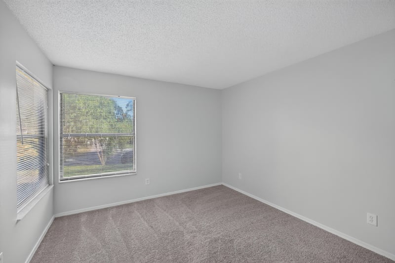 Bedroom with window view, photographed by Megapixeler on Apple Oak Ct, Jacksonville