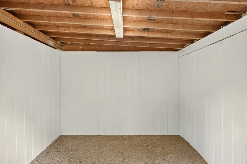 Interior of shed with wood ceiling at 1161 Whispering Pines Rd, Jacksonville, FL 32259