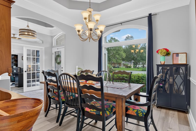 Dining room with French doors to the lanai at 2304 Spring Hill Ct, Orange Park, FL