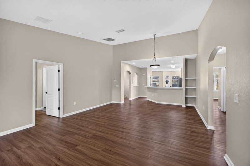 Hallway view toward kitchen with pendant light at 3750 Silver Bluff Blvd, Orange Park, FL