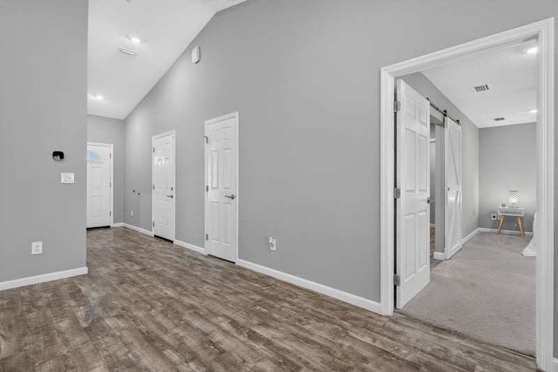 Hallway view toward bedrooms, photographed by Megapixeler on Birch Run E, Orange Park