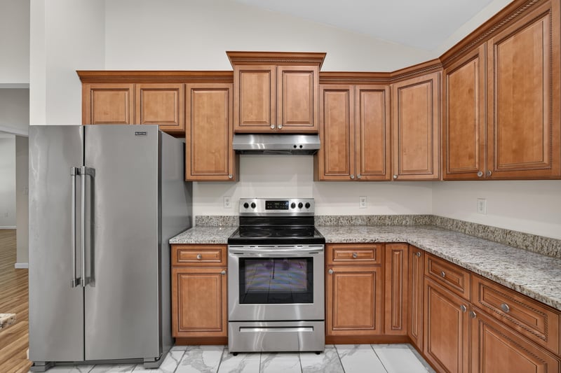 Kitchen with stainless range and refrigerator at 1012 Fruit Cove Rd, Jacksonville, FL 32259