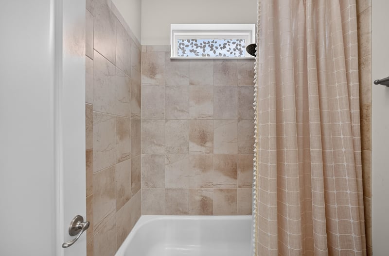 Bathroom shower with tile surround at 276 Cross Ridge Dr, Ponte Vedra Beach, FL 32081