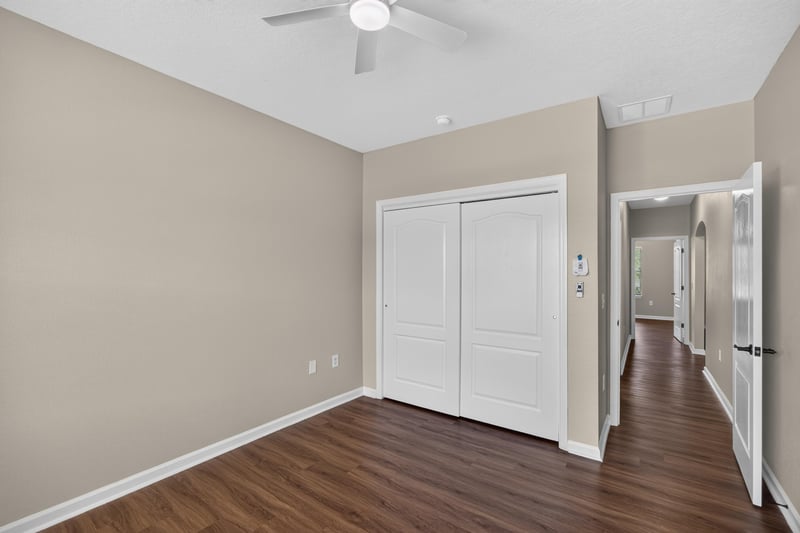 Room with closet doors and hallway view at 3750 Silver Bluff Blvd, Orange Park, FL