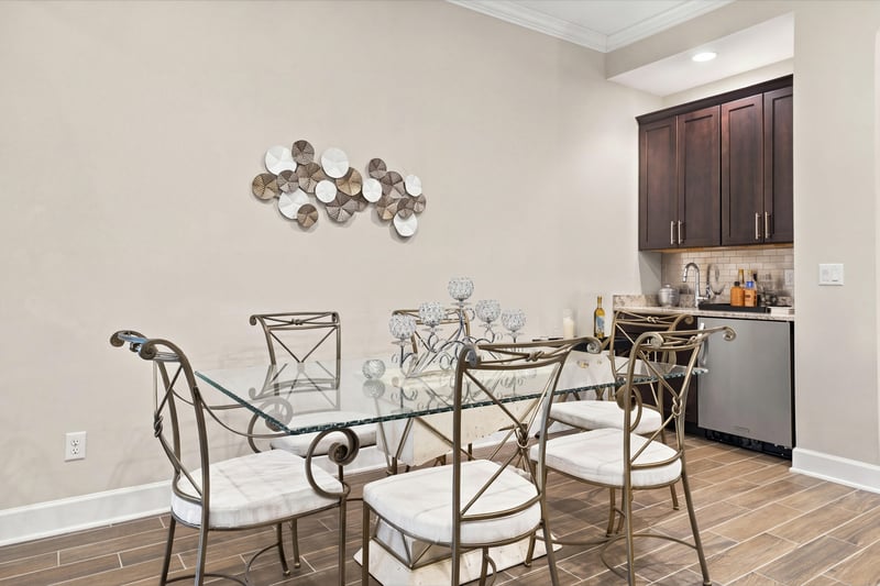 Dining area with wine fridge, photographed by Megapixeler on Lucena Ln, Jacksonville, FL