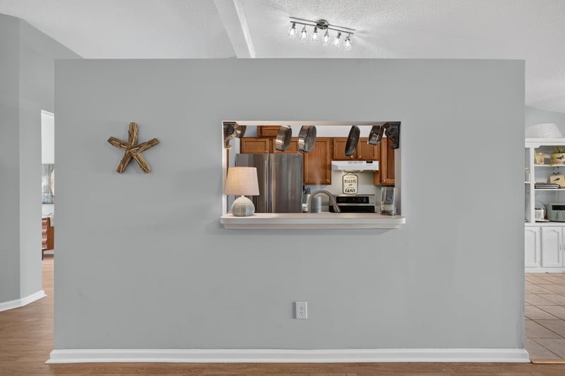 Pass-through window with starfish decor at 4556 Shaky Leaf Ln N, Jacksonville, FL 32224