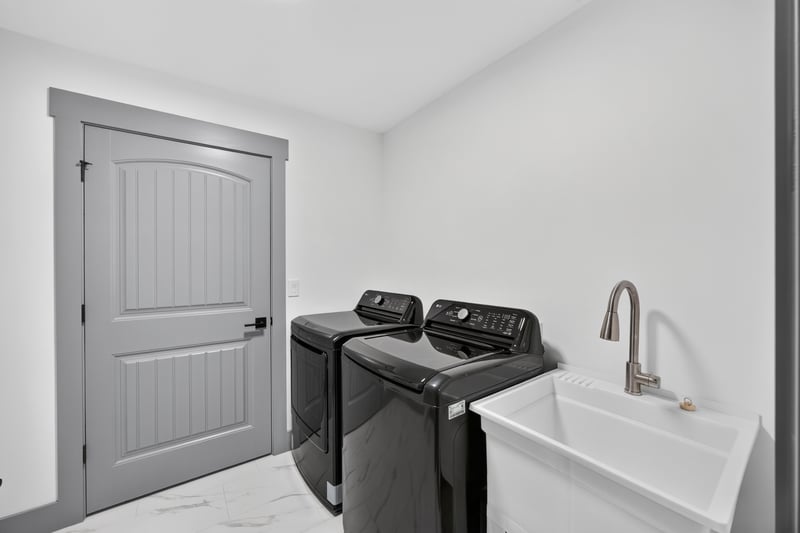 Laundry room with washer, dryer, and sink at 4800 Acacia St, Middleburg, FL 32068