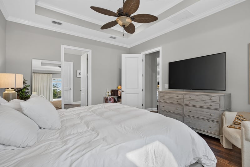 Primary bedroom second view with ceiling fan at 3328 Southern Oaks Dr, Green Cove Springs, FL 32043