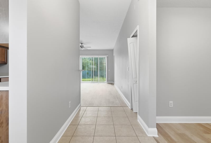 Entry hallway with tile floor leading to living area at 14187 Big Spring St, Jacksonville, FL 32258