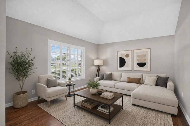 Living room furnished with sofa and area rug at 1955 GUARDED Way, Fleming Island, FL 32003