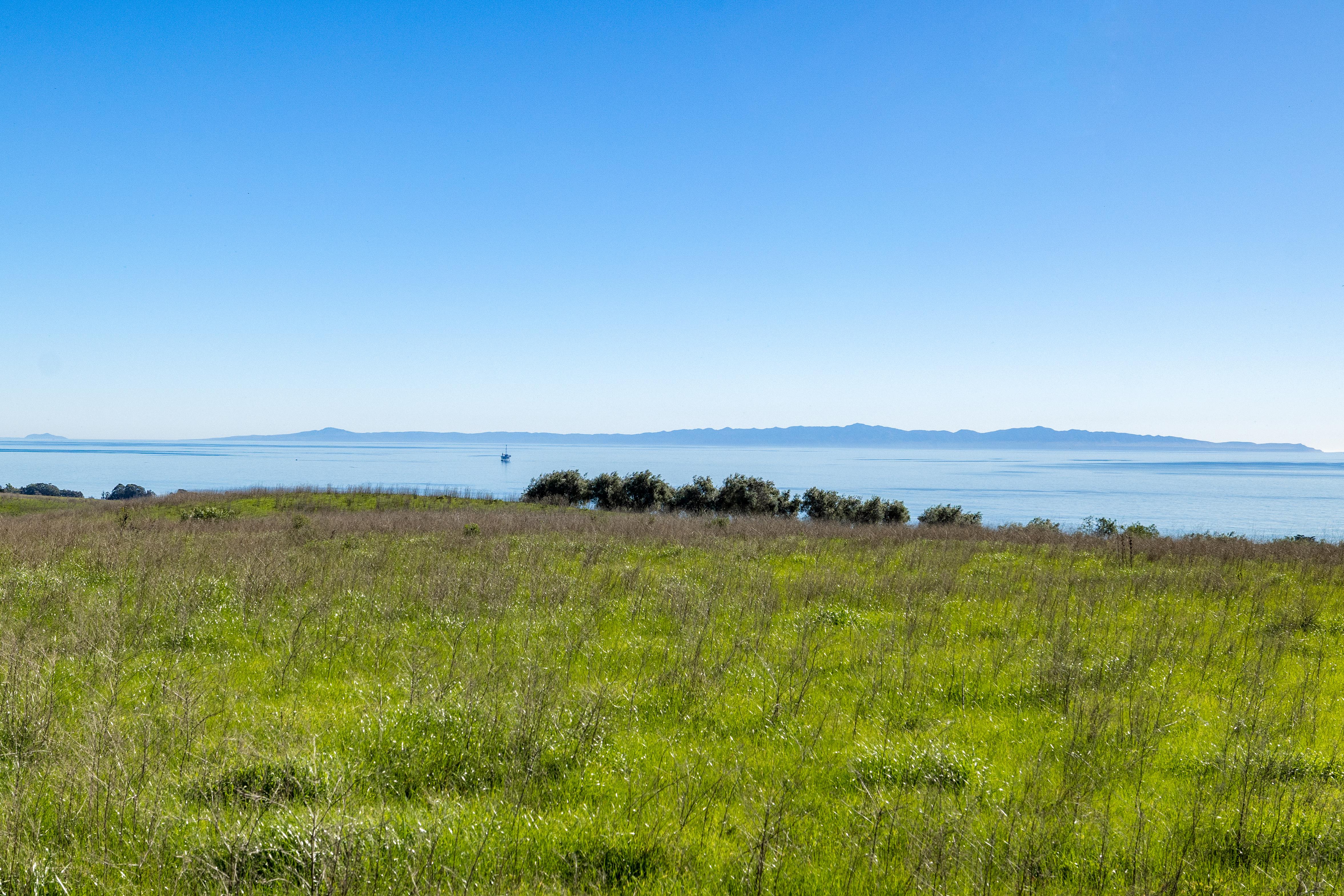 Aerial drone photography of Naples Access Rd, Goleta with Pacific Ocean and Channel Islands backdrop — VirTour Media Southern California