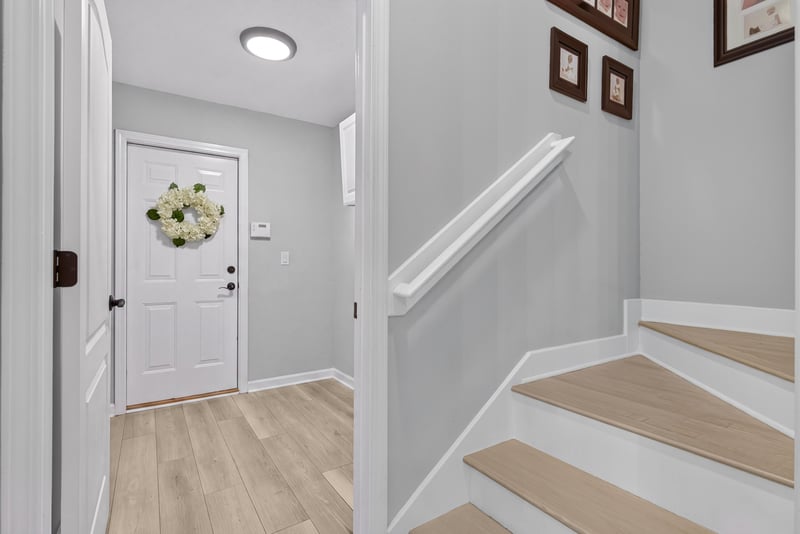 Hallway with staircase at 2304 Spring Hill Ct, Orange Park, FL