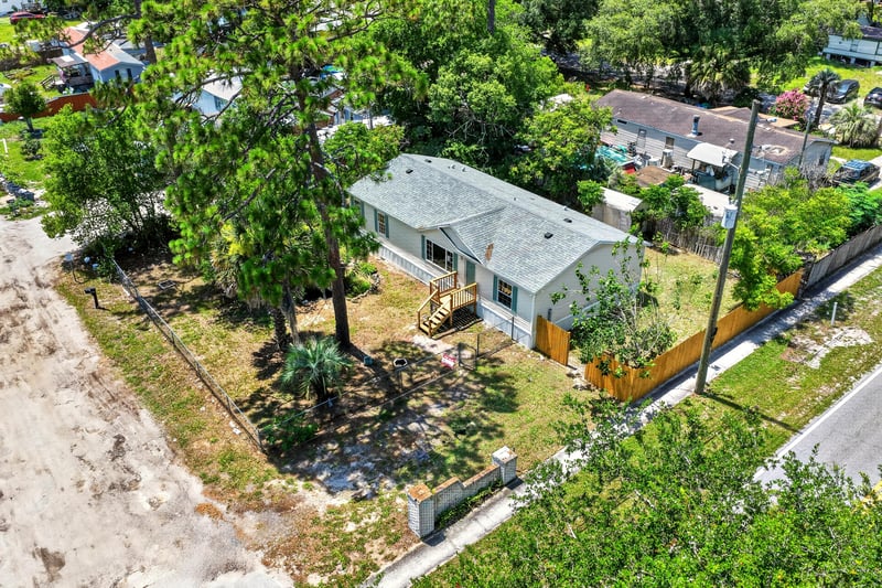Aerial view of home and street at 7603 Coach Park Dr, Jacksonville, FL 32244