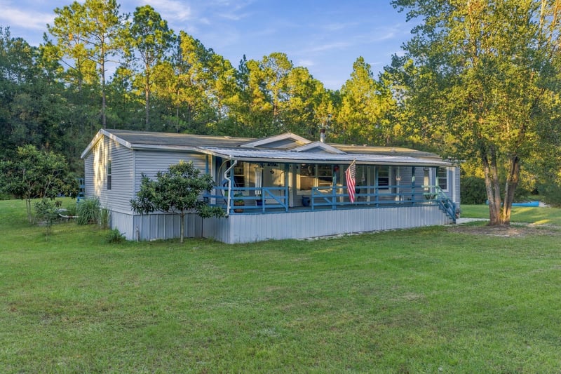 Front exterior and yard, photographed by Megapixeler on Secret Cove Rd, Middleburg, FL