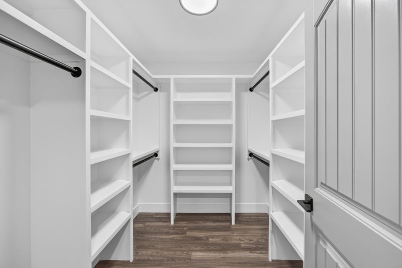 Walk-in closet with built-in shelving at 4800 Acacia St, Middleburg, FL 32068