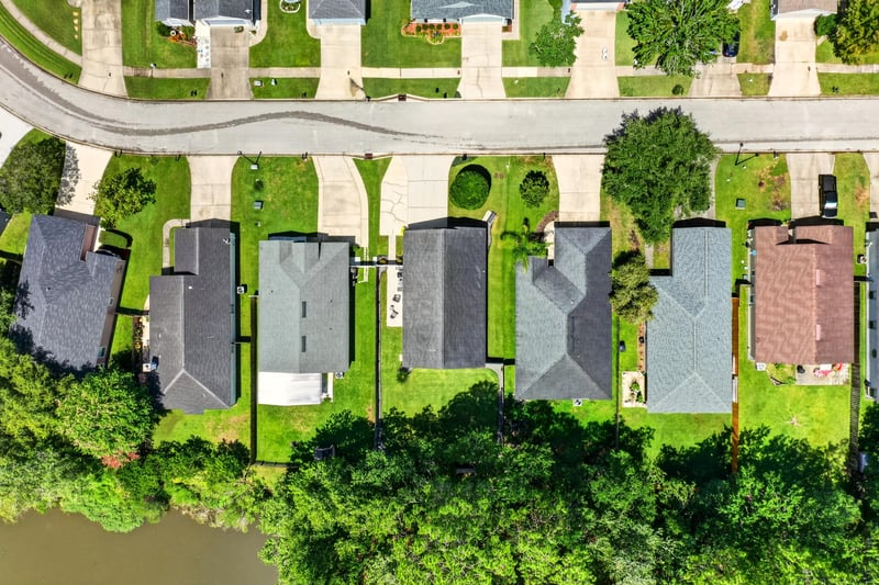 Drone view of street and neighboring homes in Middleburg, FL