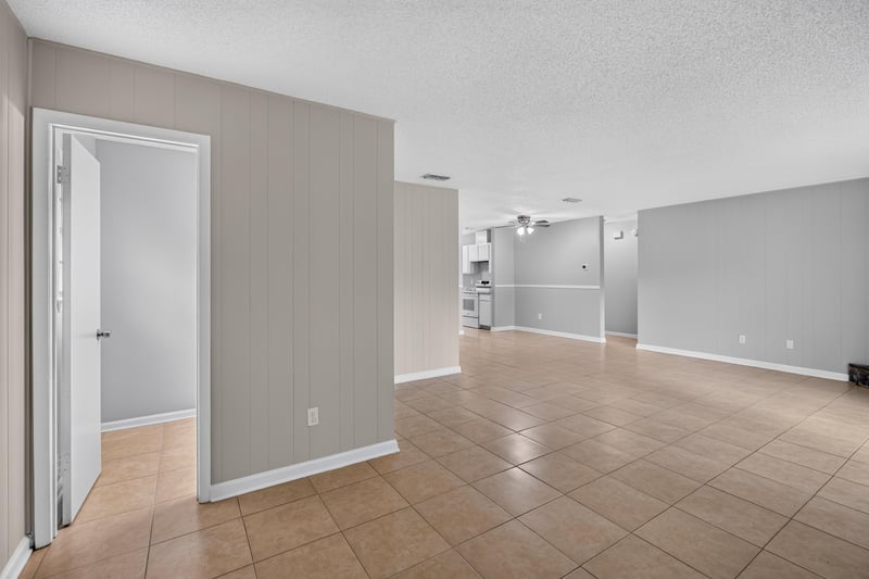 Hallway view toward kitchen with tile floor at 1040 Willow Cove Ct E, Jacksonville, FL 32233