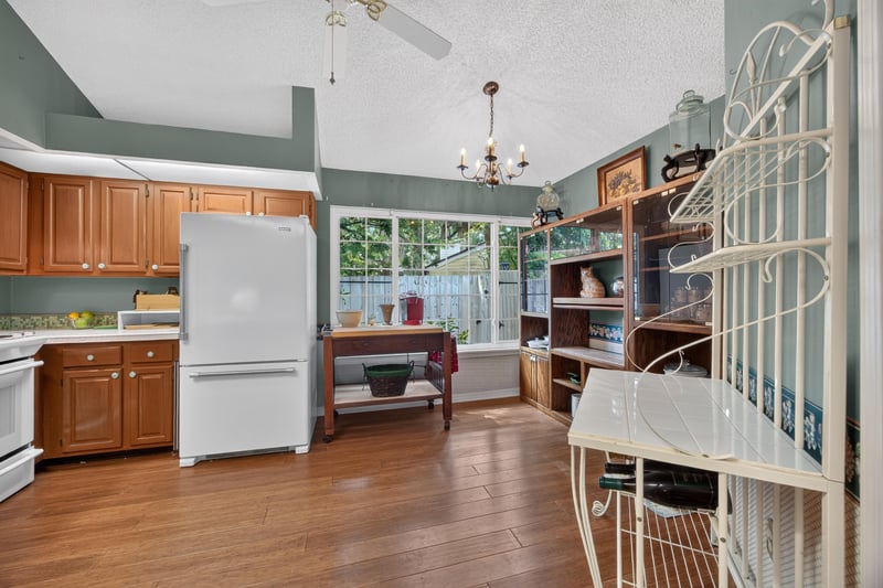 Kitchen nook with spiral staircase nearby at 4837 Pareja Ct, Jacksonville, FL 32225