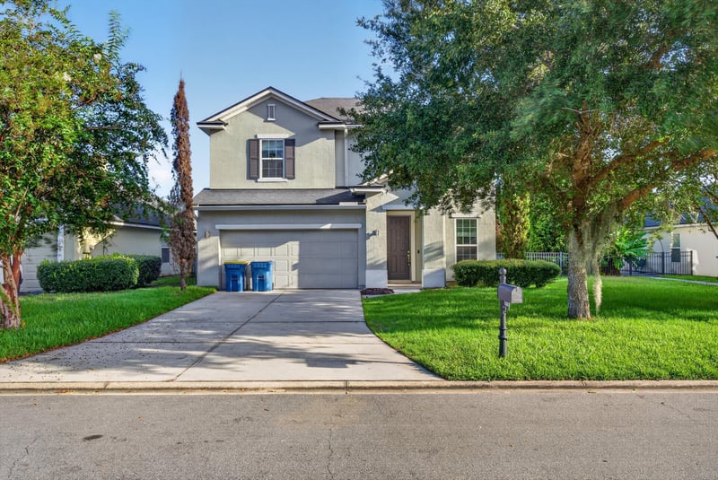 Street view of front exterior with driveway at 13685 Goodson Pl, Jacksonville, FL 32226