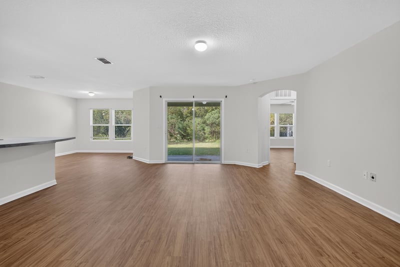 Living room with window and open layout at 95221 Siena Ct, Fernandina Beach, FL 32034