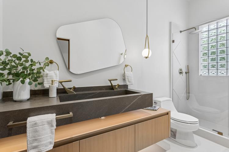 Bath with floating white oak vanity and stone trough basin, Paradise Valley