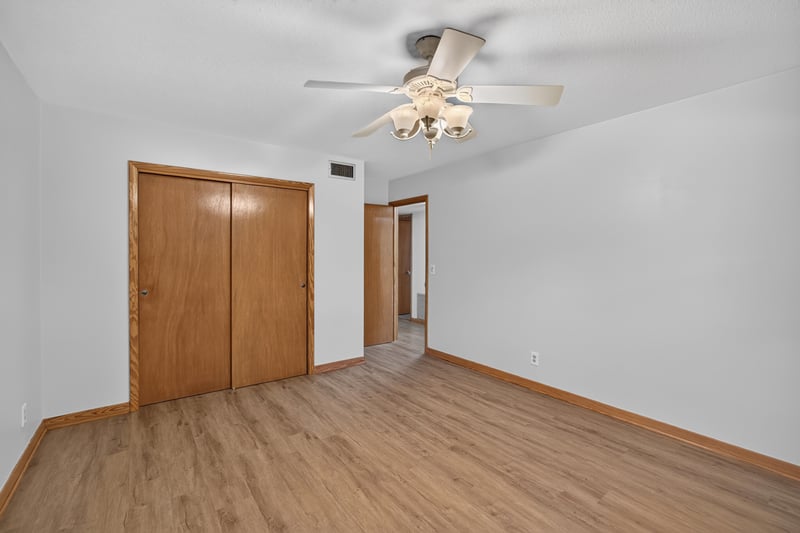 Empty bedroom with closet doors at 1834 Memory Ln, Jacksonville, FL