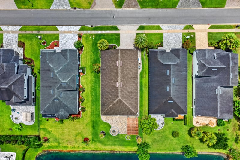Aerial close view of neighboring rooftops in St. Johns, FL