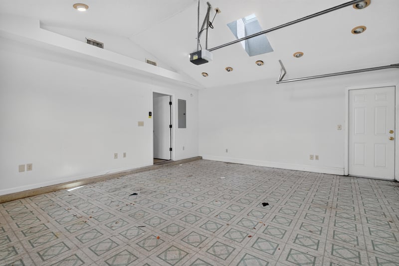 Garage with patterned tile flooring at 400 Ashcroft Landing Dr, Jacksonville, FL 32225