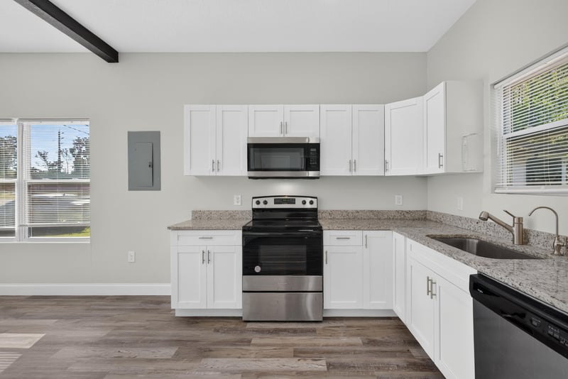 Kitchen view toward living area, photographed by Megapixeler on Lem Turner Rd, Jacksonville