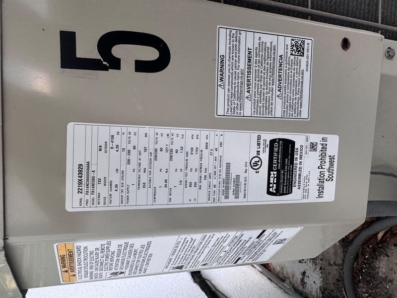 Condenser numbered 5 with nameplate at 11700 New Kings Rd, Jacksonville, FL 32219