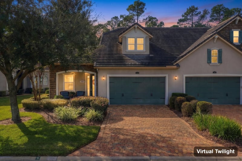 Front exterior at day-to-dusk light, photographed by Megapixeler on Lucena Ln, Jacksonville, FL