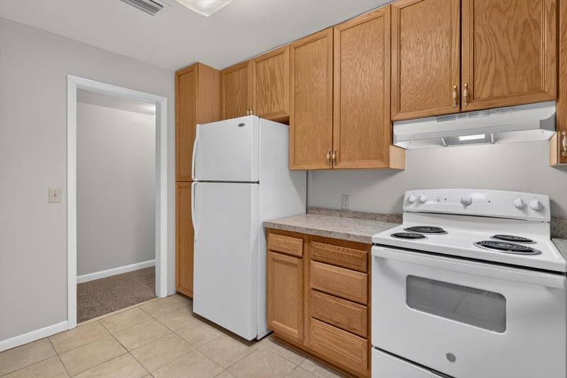 Kitchen with refrigerator and range at 2618 Arlex Dr E, Jacksonville, FL