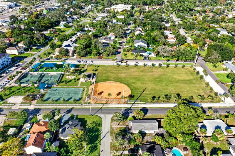 Aerial view of tennis courts, a swimming pool and a ball field in Jacksonville Beach, FL