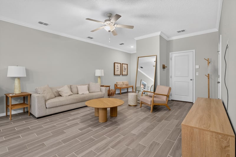 Living room with sofa and coffee table at 1186 Beach Dune Dr, Jacksonville, FL 32233