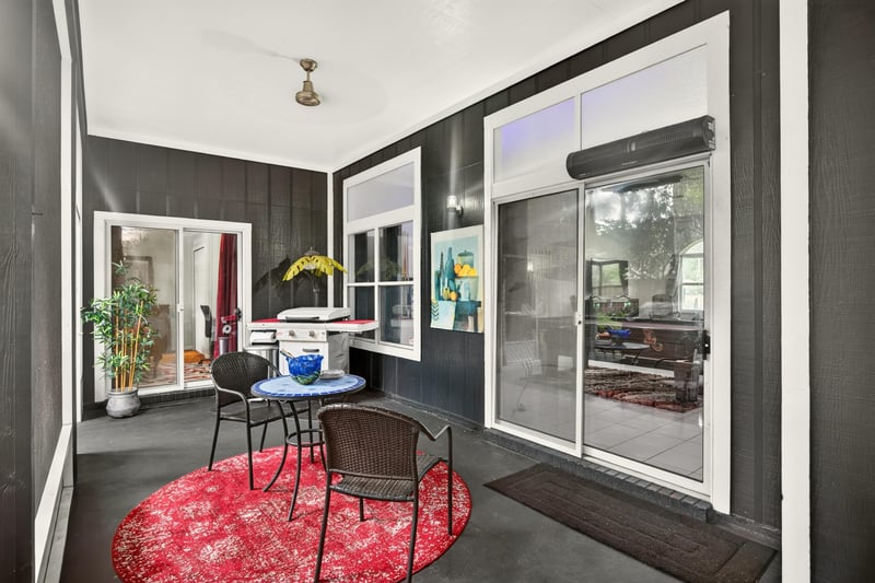 Enclosed sunroom with table and seating at 1346 Gately Ct, Jacksonville, FL 32225