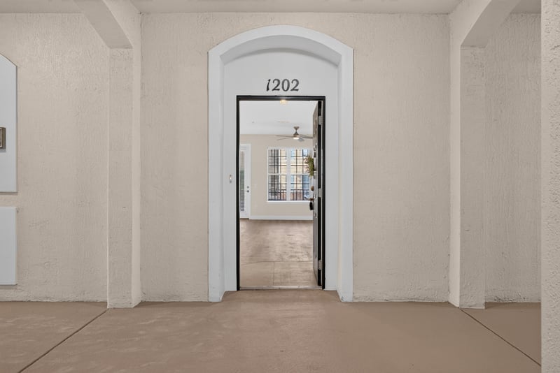 View through the open front door into the entry at 11251 Campfield Dr unit 1202, Jacksonville, FL 32256