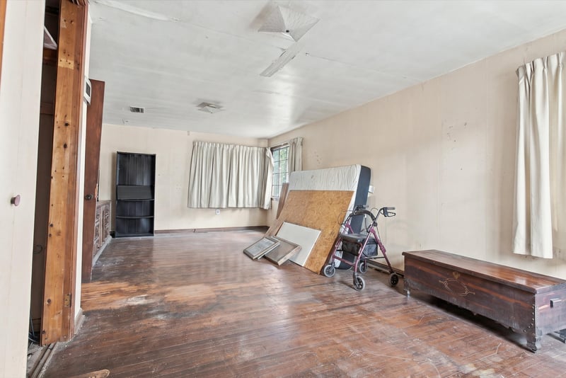 Room with parquet flooring and construction materials at 1807 Idlewild Ave, Green Cove Springs, FL