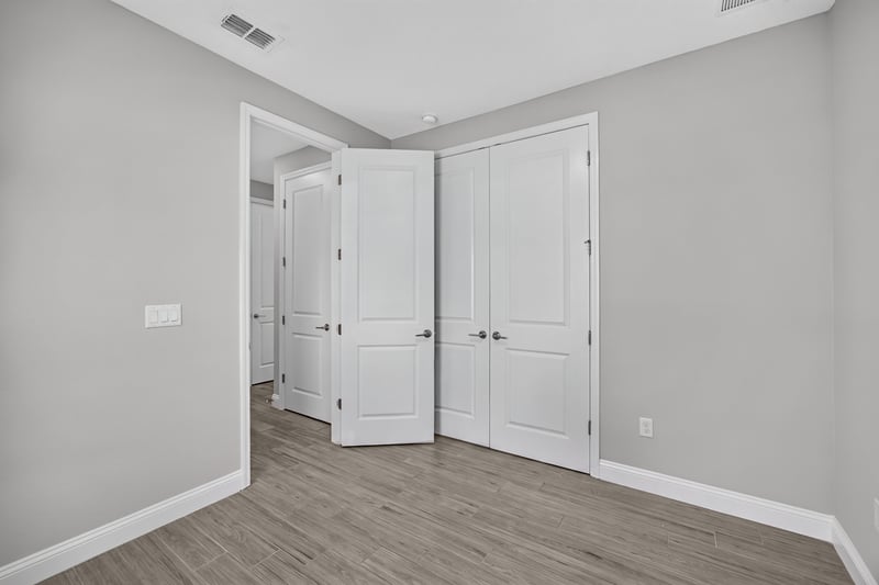 Bedroom with a double closet at 91 Tilloo Ct, St. Johns, FL