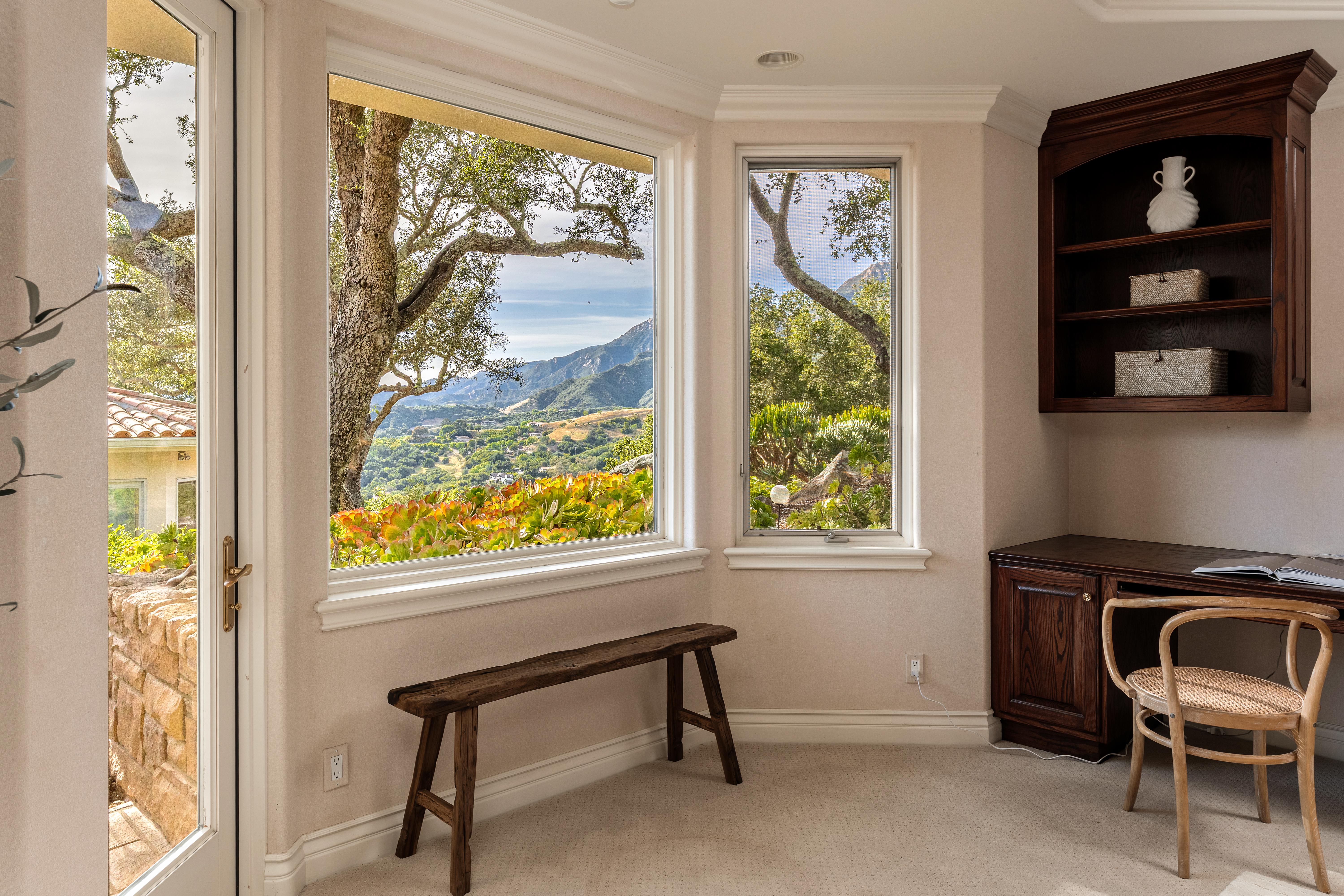 Professional real estate photography of primary suite and ocean-view terrace at 450 El Cielito Rd, Santa Barbara — Matterport virtual tour and still photography package for a distinguished Santa Barbara Riviera estate above Hope Ranch. Our team captured still photography, aerial drone photography, twilight photography, a Matterport virtual tour, a 2D floor plan, and a custom property website from afternoon through twilight.