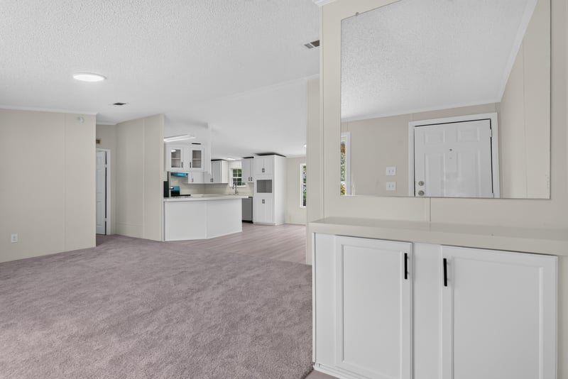 Open living area with kitchen island visible at 7603 Coach Park Dr, Jacksonville, FL 32244