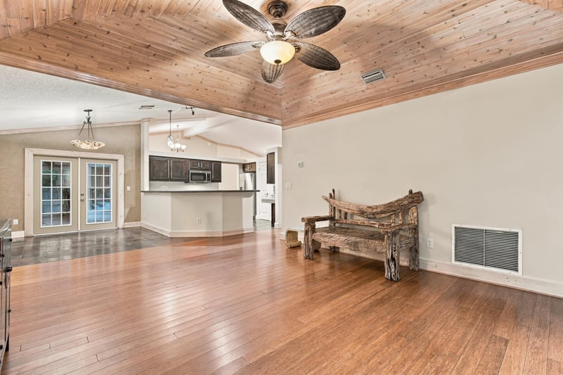 Living room open to kitchen, photographed by Megapixeler on Winding Springs Ct, Jacksonville
