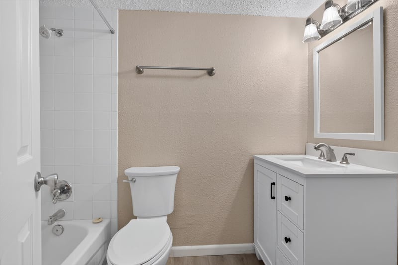 Bathroom with tub-shower and vanity at 5811 Atlantic Blvd unit 47, Jacksonville, FL 32207