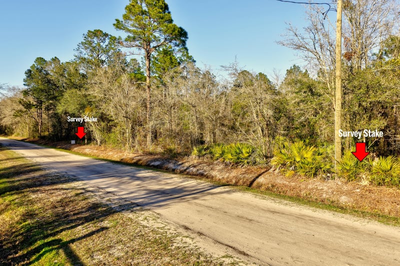 Ground View showing Stakes at 10250 Zigler Ave, Hastings, FL 32145