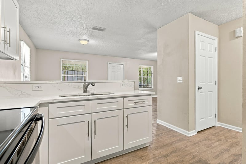 Kitchen sink and white countertop at 219 Shortreed St, Jacksonville, FL 32254