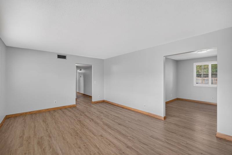 Empty dining area opening to hallway at 1834 Memory Ln, Jacksonville, FL