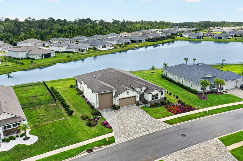 Drone view of the home and pond in Fernandina Beach, FL